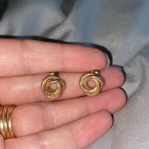 Gold colored costume earrings